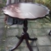 Value of a Brandt Mahogany Pie Crust Table - four legged pedestal pie crust table