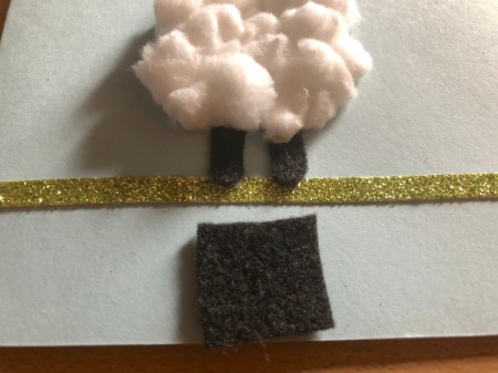 Puffy "Fleece Navidad" Card - for head cut out a square of black felt the width of the feet