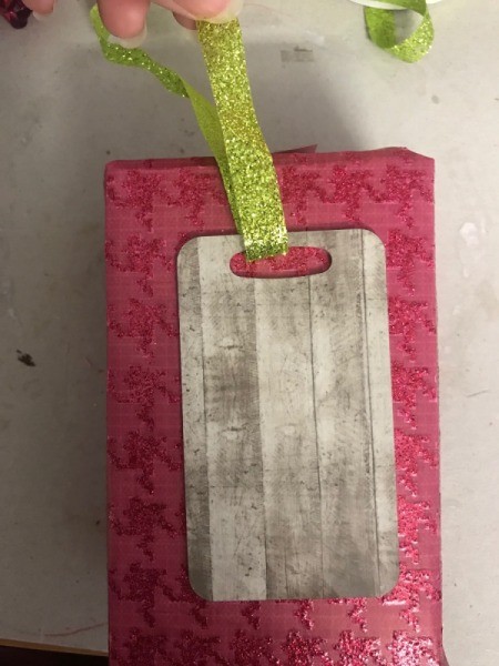 Giftbox Christmas Countdown Calendar - put a length of ribbon through the tag and glue to the top of the box