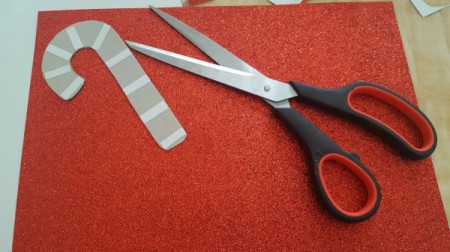 Sparkling Paper Ornaments - candy cane shape on red glitter paper