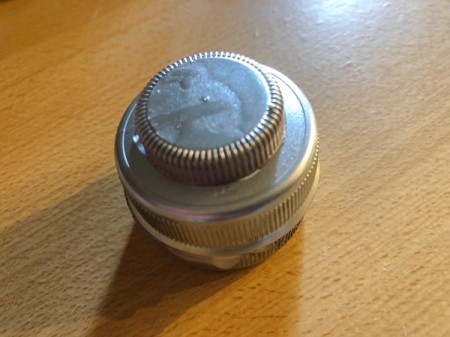 Plastic Bottle Cap Ornaments - glue a small cap on top