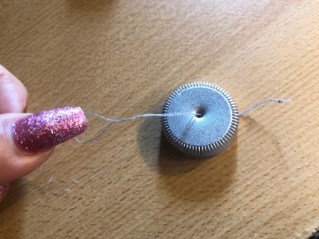 Plastic Bottle Cap Ornaments - thread with a string loop from earlier