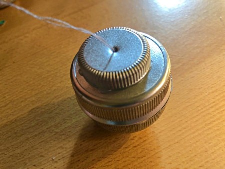Plastic Bottle Cap Ornaments - glue stringed cap the the other side which now becomes the top
