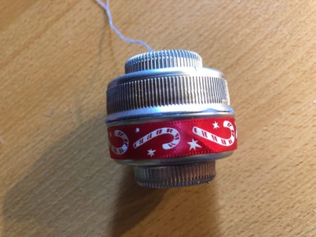 Plastic Bottle Cap Ornaments - glue ribbon around the sides