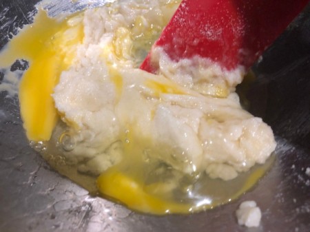 adding egg to butter and sugar