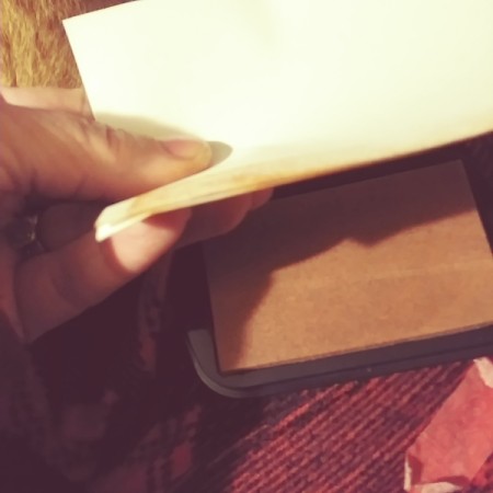 Distressing Paper with an Ink Pad - slide 4 corners across the pad