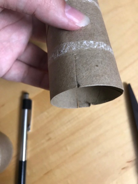 Kids' Christmas Tree Craft - cut slits in the bottom of the tube on opposing sides