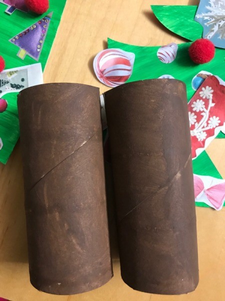 Kids' Christmas Tree Craft -  place trees in the tubes using the slits