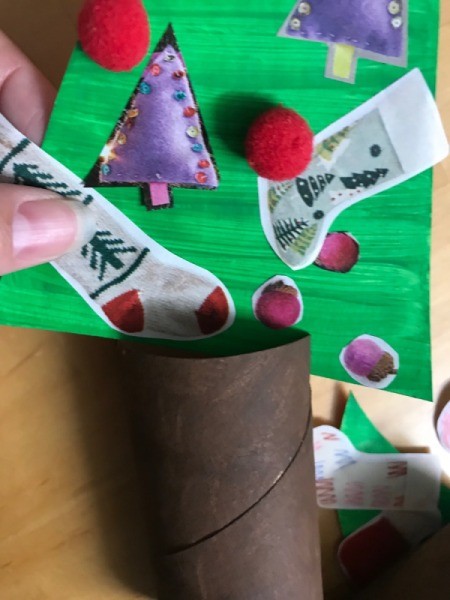Kids' Christmas Tree Craft - inserting the finished tree