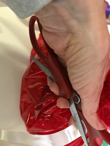 DIY Gift Baskets - use scissors to curl the ribbon