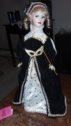 Identifying a Porcelain Doll - doll in elegant black and white gown with matching hat