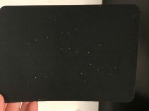 Sagittarius Constellation Card - finished card with the stars showing through the holes in the card front.