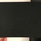 Sagittarius Constellation Card - finished card with the stars showing through the holes in the card front.