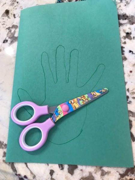 Christmas Tree Card Made by a Toddler - tracing on green paper