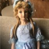 Identifying a Porcelain Doll - doll in blue dress