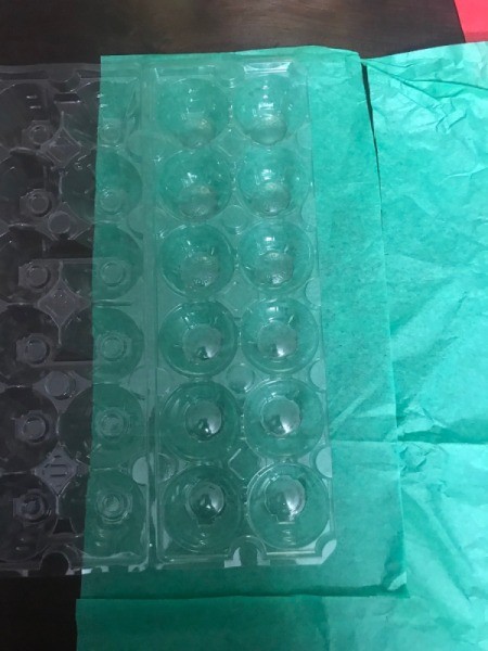 Christmas Candy Egg Carton Gift Box - measuring tissue paper against the carton