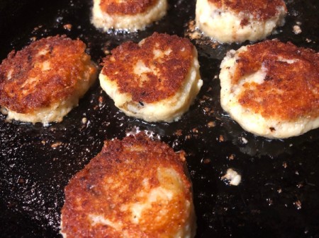 flipped Potato Patties on grill