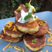 Potato Patties with sour cream cheese & chives on plate