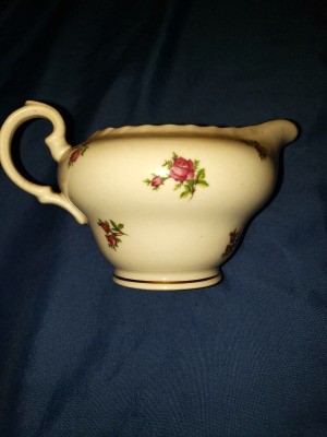 Value of Bohemian China - creamer with a rose pattern
