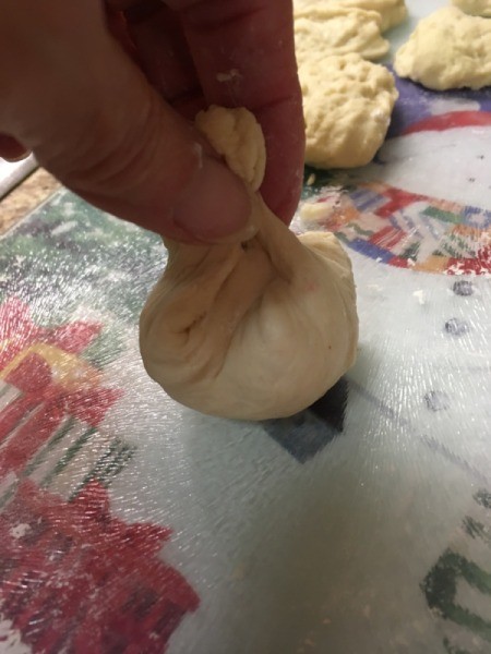 pinching filled dough together