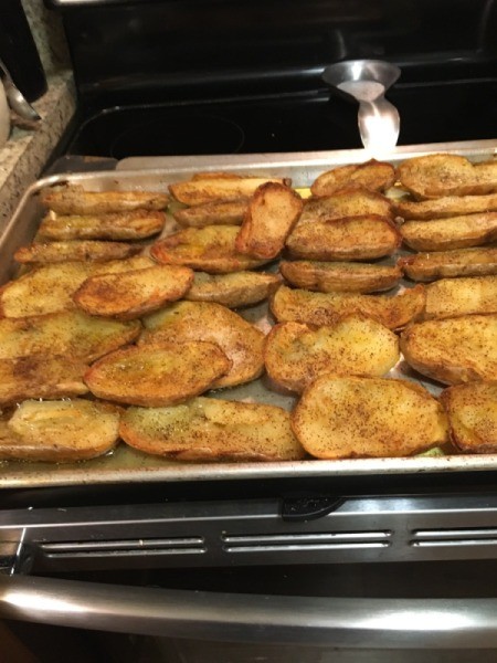 deep fried potatoes on tray