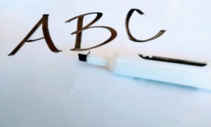 Removing Dry Erase Marker on Wood - A B C written on white background