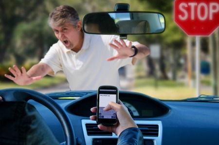 driver texting about to hit pedestrian