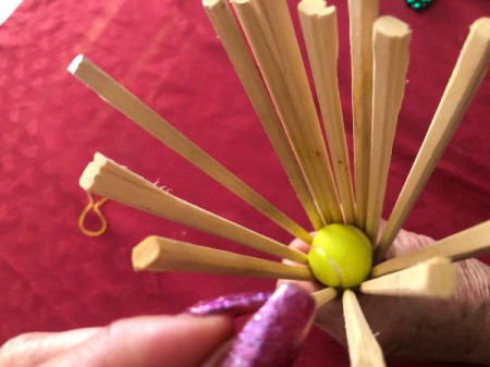 Chopstick and Bead Christmas Tree - spread the sticks out evenly to create a cone and push the ball down at the top