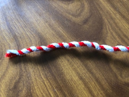 Mini Christmas Wreath - twist the red and white pipe cleaners together