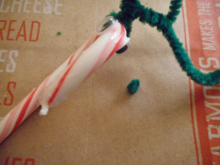 Reindeer Candy Cane - repeat on the other side, cut a tiny piece of pipe cleaner for the nose and attach at the tip of the cane