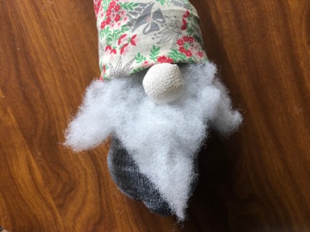 DIY Gnome Dolls - put hat on the gnome's head so that it touches the nose