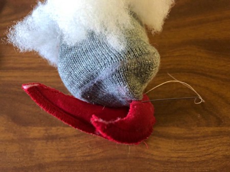 DIY Gnome Dolls - sew the shoes onto the bottom of the gnome