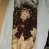Identifying a DanDee Doll - doll with cream skirt and dark jacket
