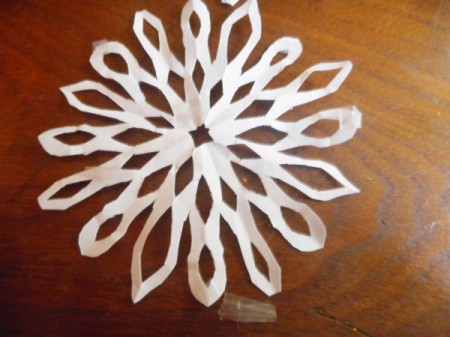 Snowy Window or Mirror - put small tape rolls on the snowflakes to hold them to the window or mirror