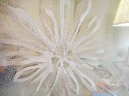 Snowy Window or Mirror - spray lightly over flake and heavier around the design