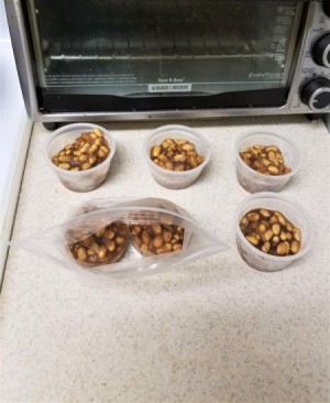 Individual portions of baked beans that have been frozen.