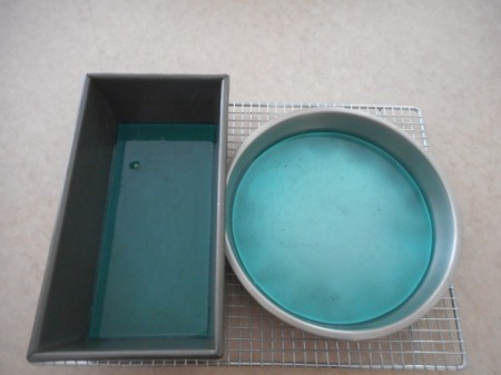 pouring colored sugar in pan