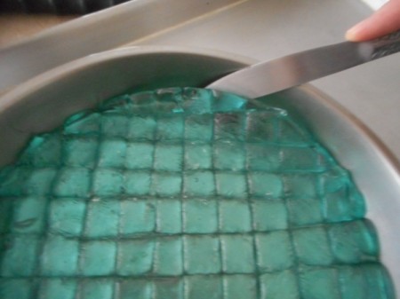 lifting Hard Tack Candy in pan