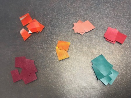 Christmas Ornament Card - piles of different colored papers