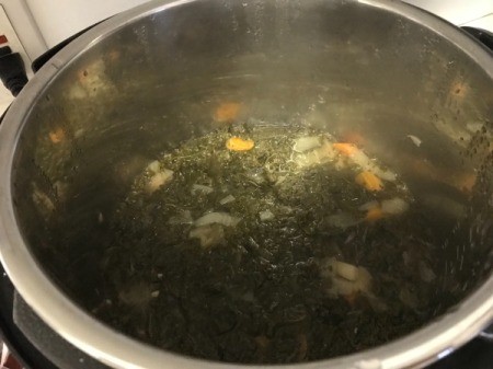 adding whey and kale to pan