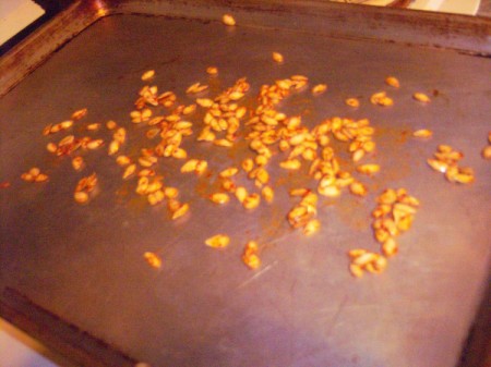 Butternut Squash seeds spread on cookie sheet
