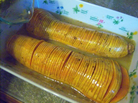 Honey Glazed Butternut Squash in baking dish with water
