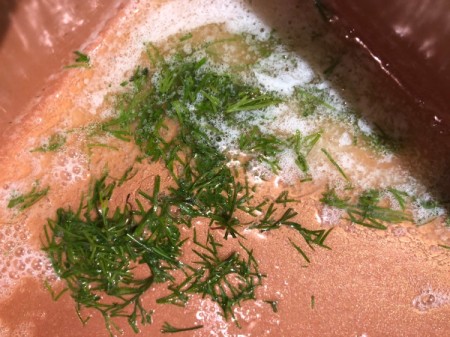 chopped dill in lemon butter