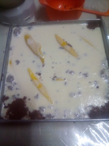 cream poured on Cake layers