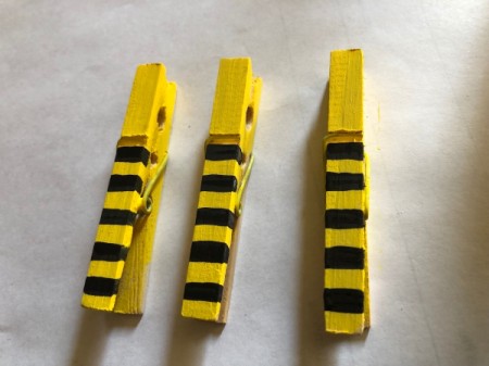 "Bee Mine" Clothespin Craft - painted black stripes on upper part of the pins