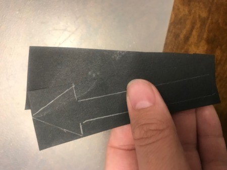 Paper Plate Clock - lay the paper with the traced shape on top of another piece of black paper the same size