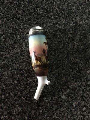 Identifying a Porcelain Container - tall narrow porcelain container with silver lid, pipette at bottom and images of deer around the top