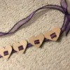 Toddler Birthday Sash - finished sash with 4 hearts strung on purple ribbon