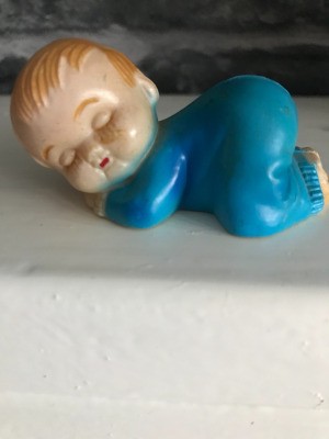 Value of a Small Plastic Figurine - sleeping boy figurine