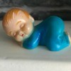 Value of a Small Plastic Figurine - sleeping boy figurine